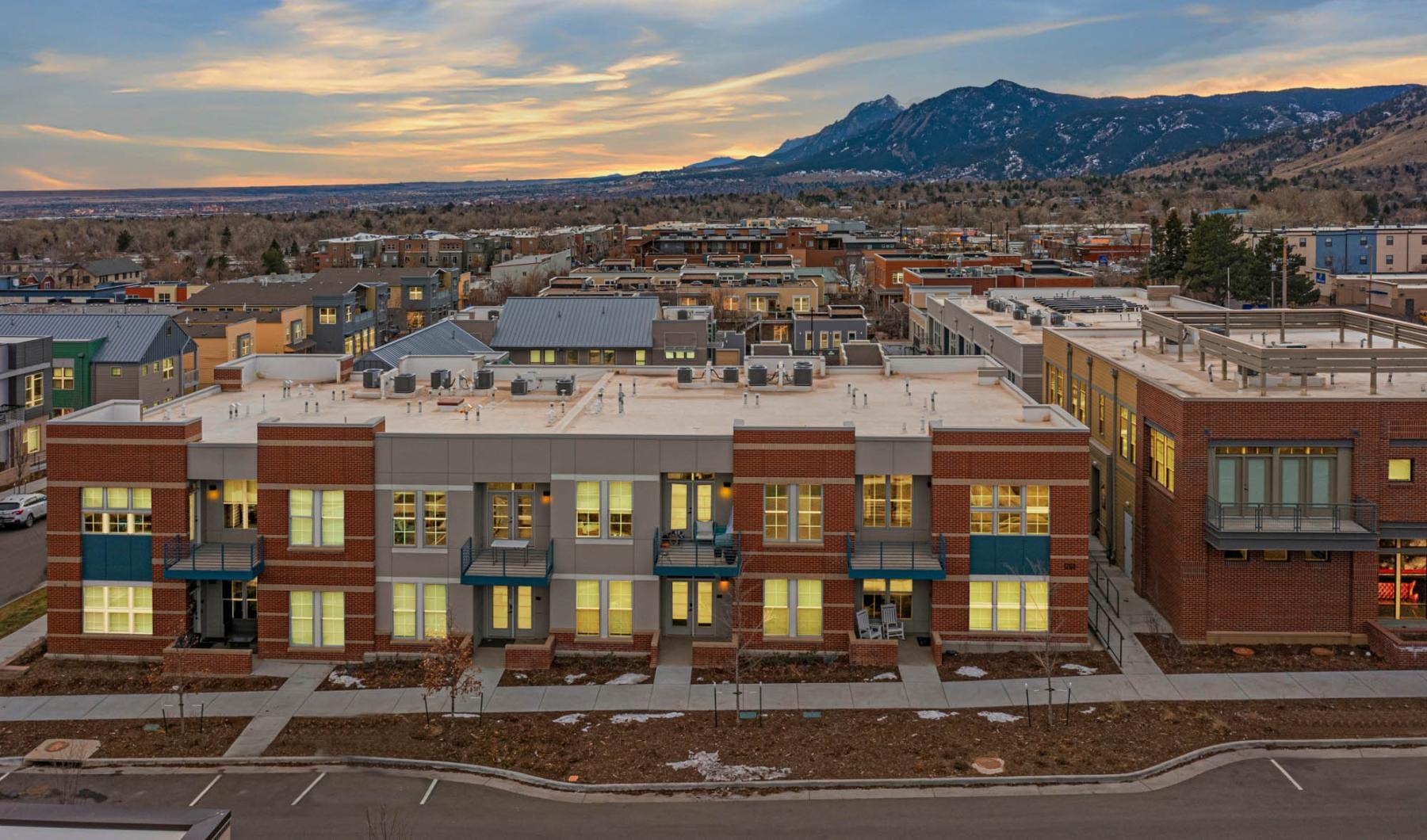 a building with a mountain in the background